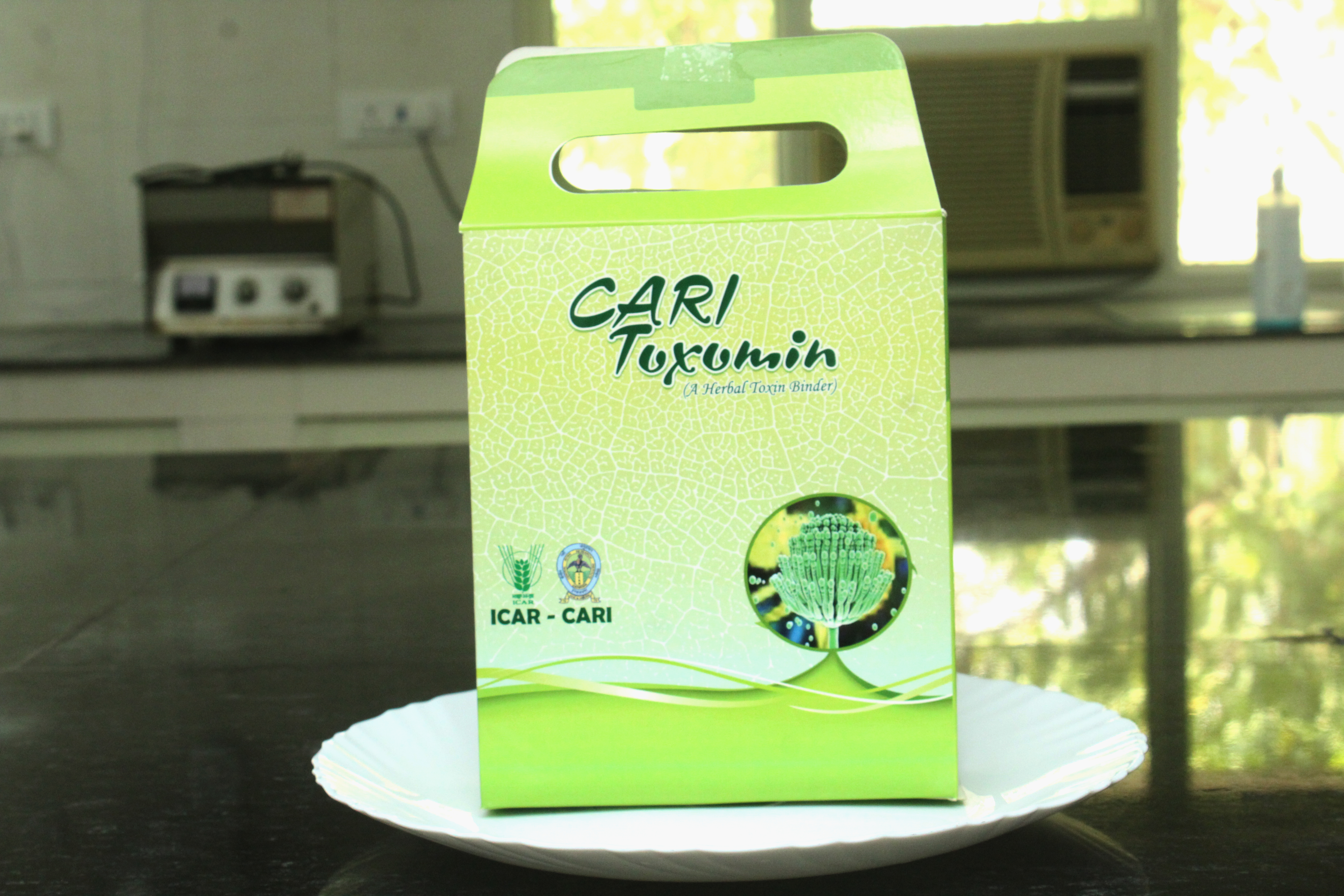 CARI- TOXOMIN BINDER